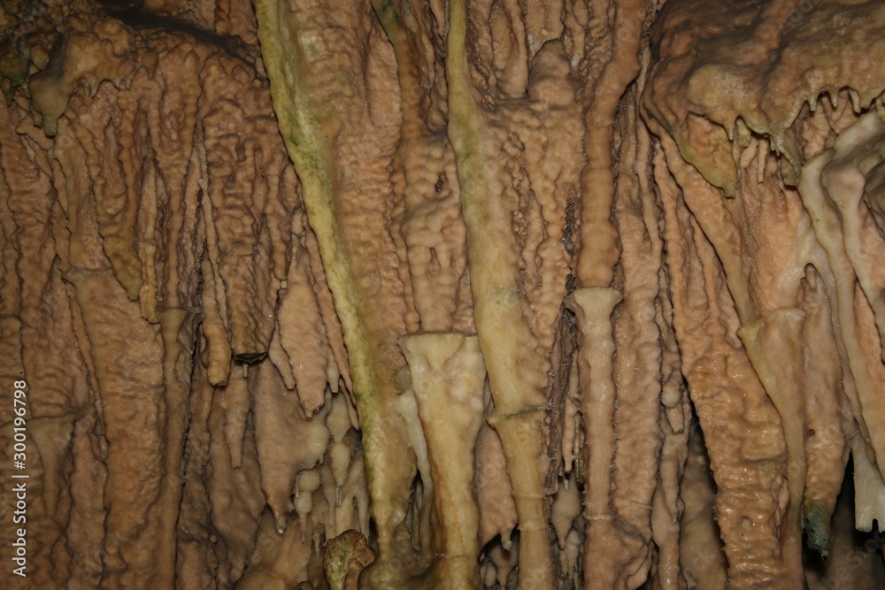Naklejka premium The famous caves of Diros, Nature's underground Cathedral near Sparta, in Peloponnese-Greece. An amazing formation of stalactites and stalagmites and a neolithic burial site in an underground network 