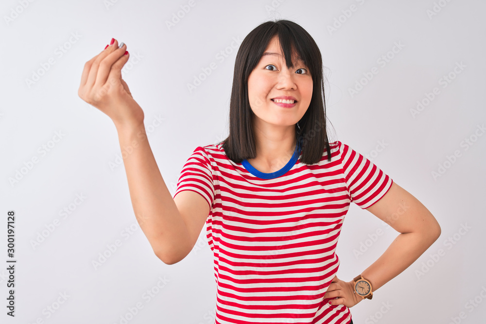 Young beautiful chinese woman wearing red striped t-shirt over isolated white background Doing Italian gesture with hand and fingers confident expression