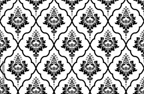 Wallpaper in the style of Baroque. Seamless vector background. White and black floral ornament. Graphic pattern for fabric, wallpaper, packaging. Ornate Damask flower ornament
