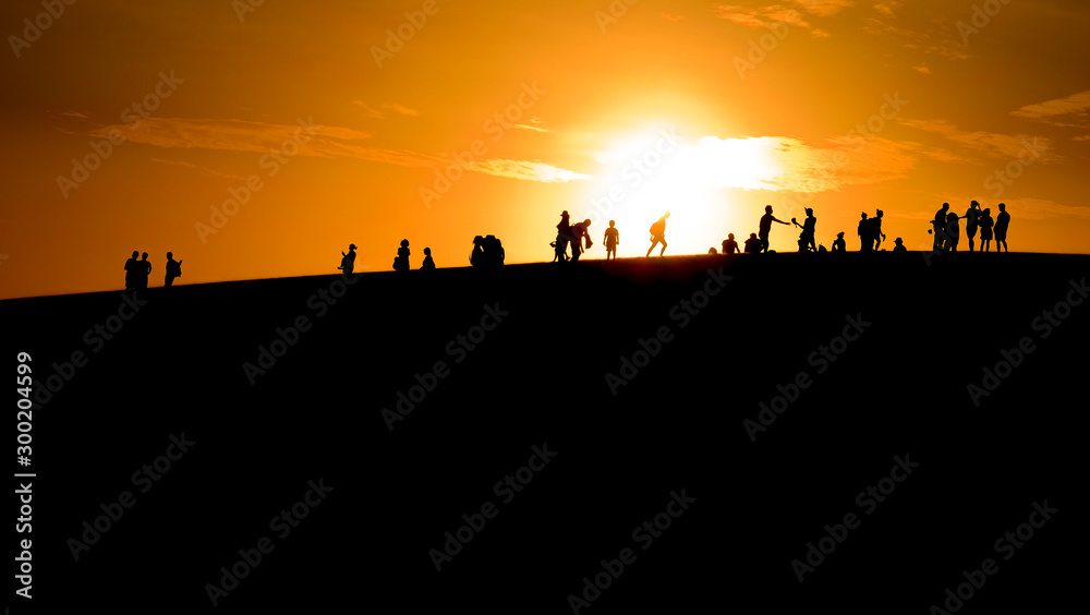 Sillhouette image of sunset at hill in the evening Sillhouette image of sunset at hill in the evening