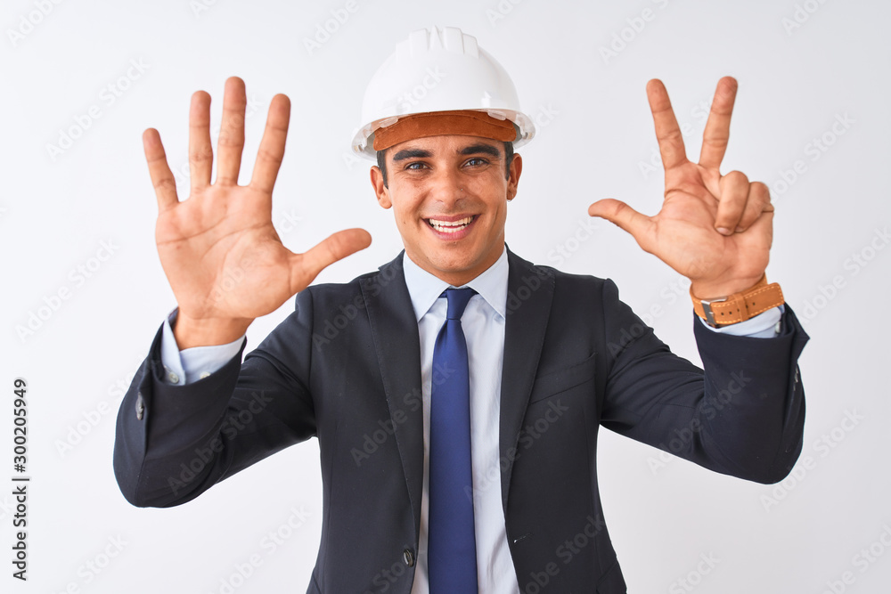 Young handsome architect man wearing suit and helmet over isolated white background showing and pointing up with fingers number eight while smiling confident and happy. Young handsome architect man wearing suit and helmet over isolated white background showing and pointing up with fingers number eight while smiling confident and happy.