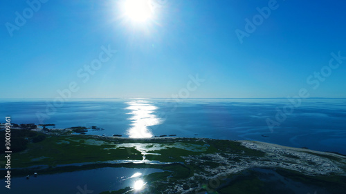 Aerial image of dusk on the shores of the Lagoa dos Patos, Mostardas in Brazil photo