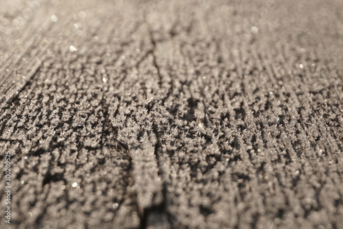wooden surface with frost close up 