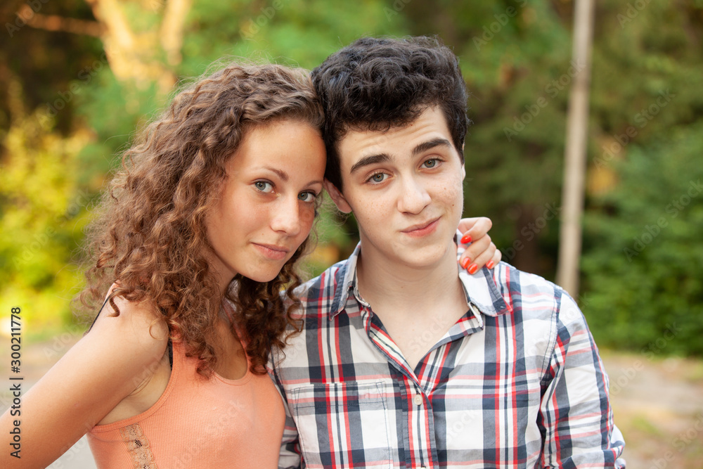 Portrait happy young teenage couple outdoor Portrait happy young teenage couple outdoor