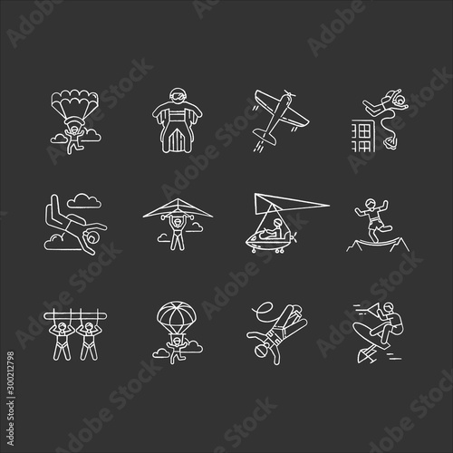 Air extreme sports chalk icons set. Skydiving, parachuting, wingsuiting. Outdoor activities. Paragliding, aerobatics and bungee jumping. Adrenaline entertainment. Isolated chalkboard illustrations