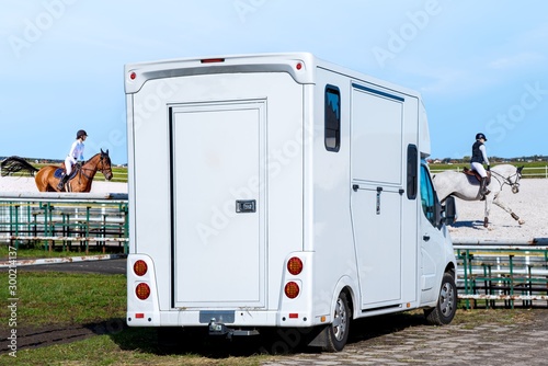 Horse transportation van . Funny horse transport . sports horse . the jockey operates a horse
