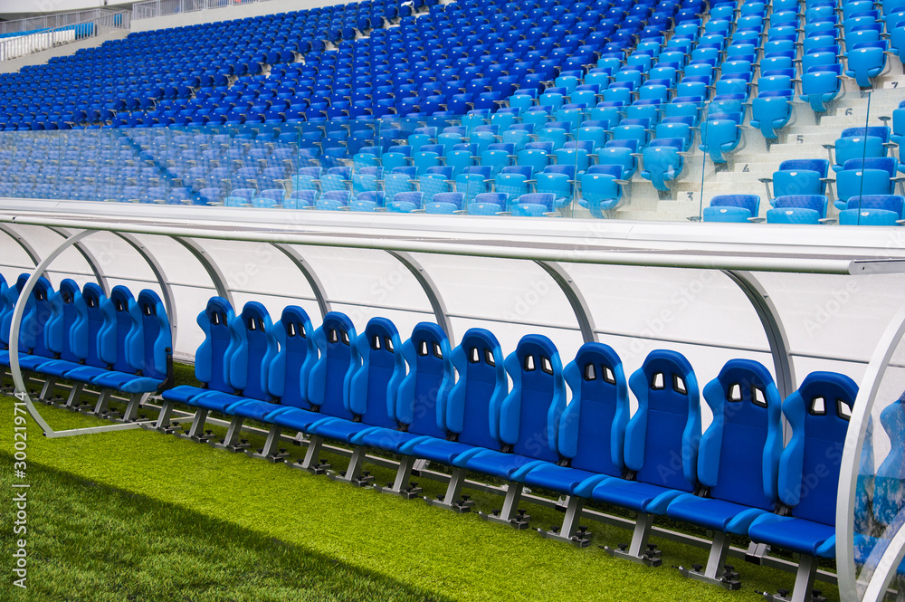 Fototapeta premium Blue bench or seat or chair of staff coach in the stadium of football