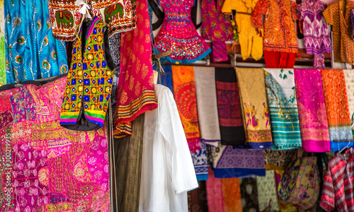 Colorful clothes for sale at the market, Rajasthan, India © Amanjot