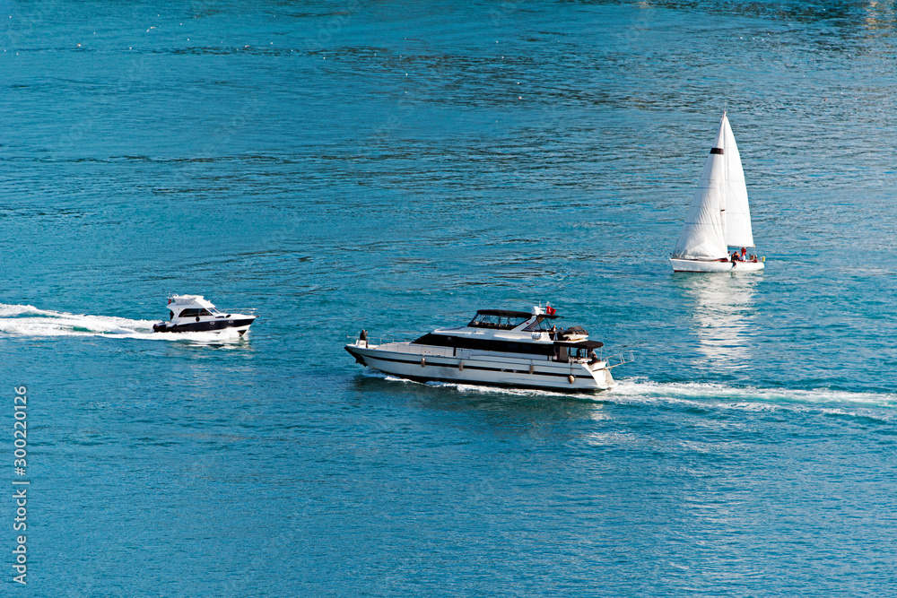 Fototapeta premium yacht and a motor boat in the sea