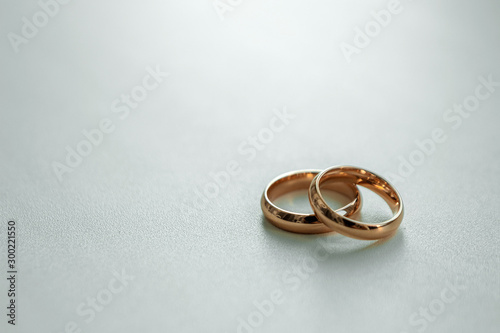 Gold wedding rings. The concept of marriage, family relationships, wedding paraphernalia.