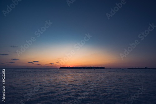 Key West colorful sunset with island