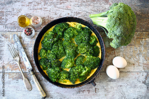 Broccoli casserole. Keto diet. Omelet with broccoli and eggs. Broccoli frittata. Selective focus. Macro.