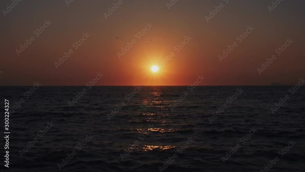 The Sun sets on a tropical sandy beach The Sun sets on a tropical sandy beach