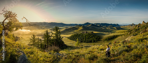 Gorkhi Terelj National Park Sunrise in Mongolia, with a campsite in the valle...