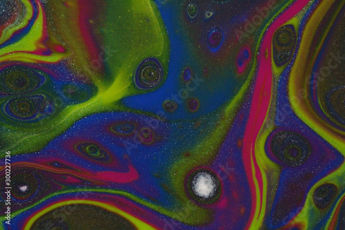 Canvas Print Colorful galaxies abound in this dark, haunting, cosmic abstract background