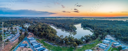 Aerial panorama of holiday park cabins on the shores of Murray RIver in Moama, NSW, Australia