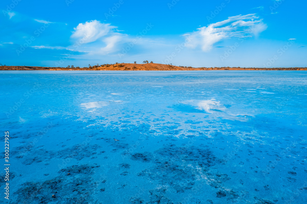 Cloud reflections in the salt of Lake Crosbie in Australia
