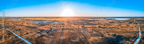 Sunset over desert in Australia - wide aerial panorama