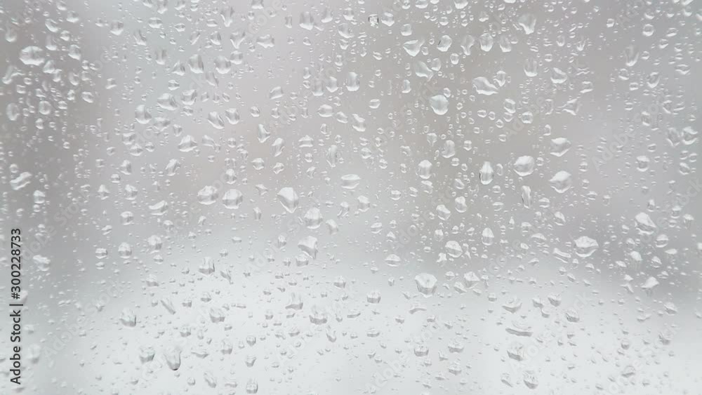 Raindrops on the window glass close-up. Raindrops on the window glass close-up.