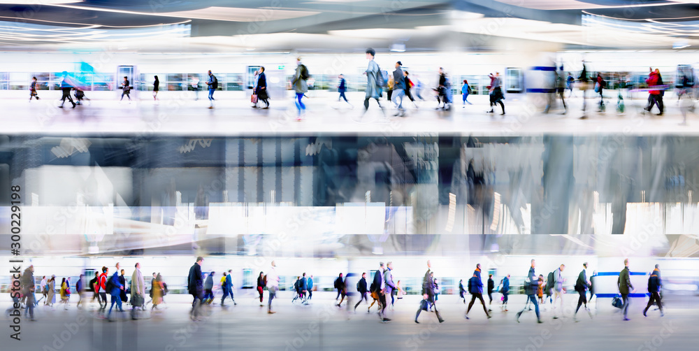 Lots of people walking on the first and second level of the transport platforms, tunnel, airport or train station. Wide panoramic view, computer generated interior.  - obrazy, fototapety, plakaty 