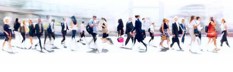 Walking people blur. Lots of people walking in the City of London. Wide panoramic view of people crossing the road. 