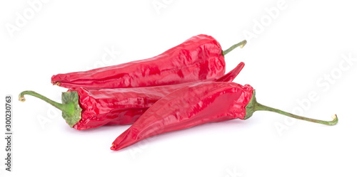 Dried red chili or chilli cayenne pepper isolated on white background cutout closeup