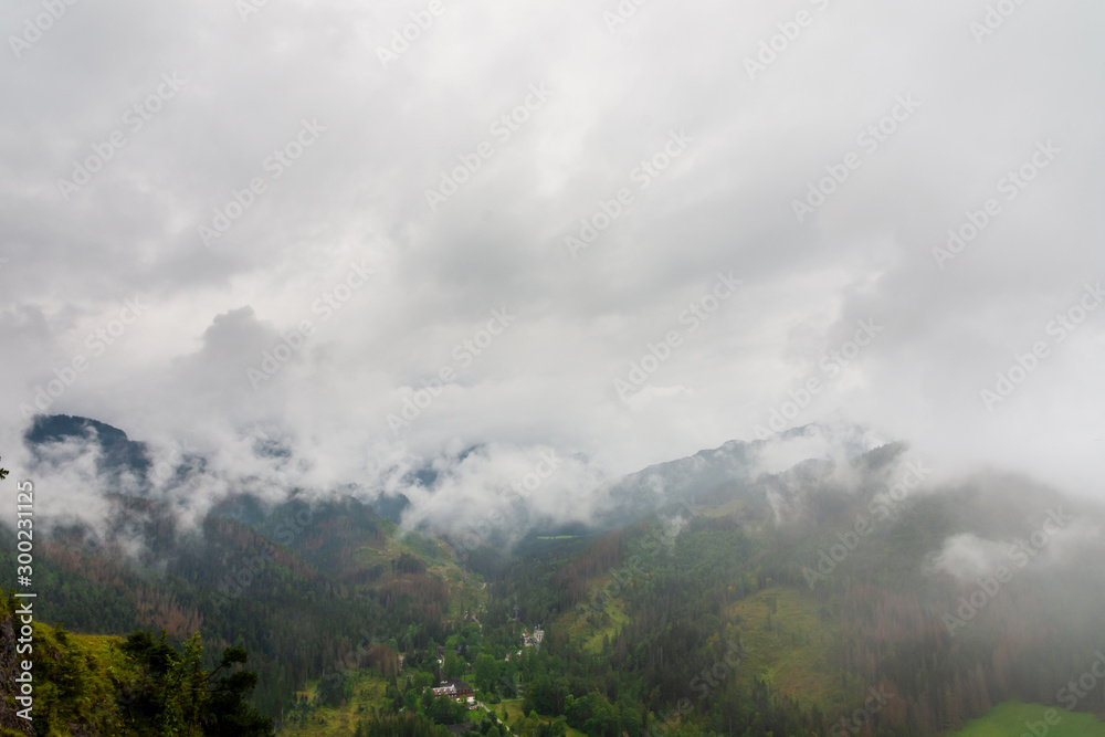 Tatry mountains. Beautiful green forests covered with fog and clouds. Tatry mountains. Beautiful green forests covered with fog and clouds.