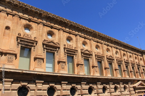 Exterior facade of historical Charles V Palace (Palacio de Carlos V) at the Alhambra Palace complex in Granada, Andalusia, Spain. photo