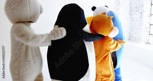 Polar bear and animal mascots characters with a message for humanity, about global warming and pollution problems on our planet