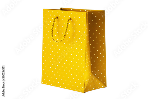 Yellow paper bag on white background