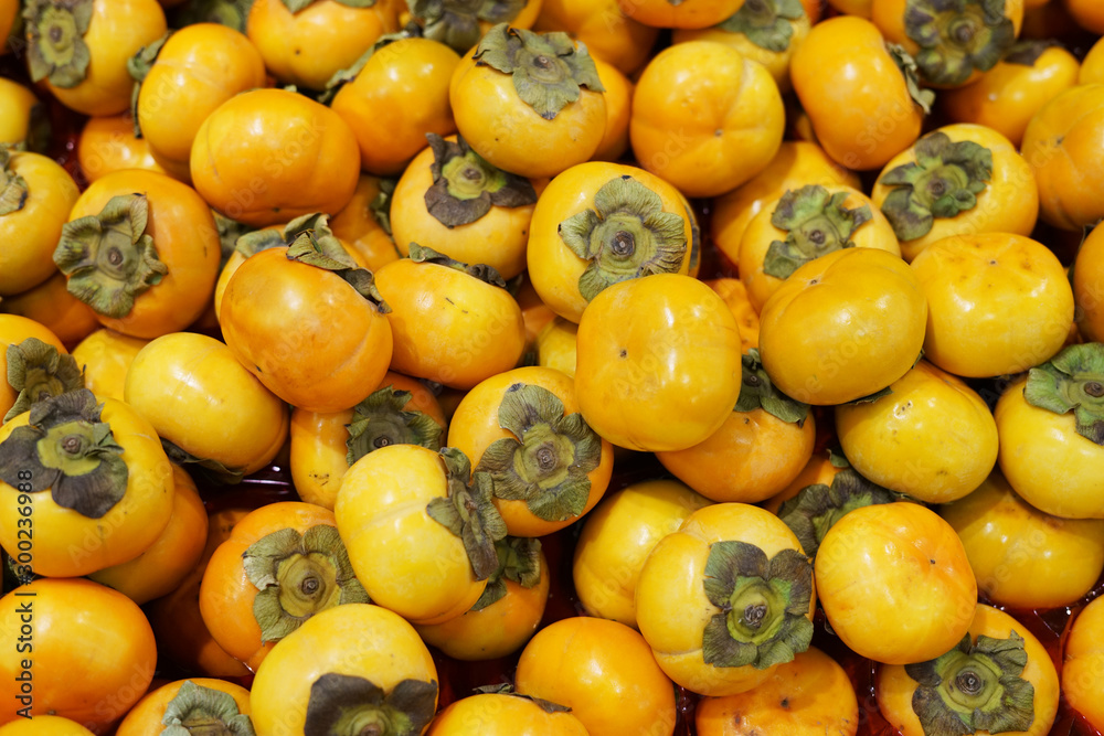 fresh persimmon as fruit background