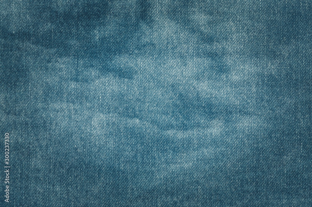 Interesting material background. Texture of blue cotton material.