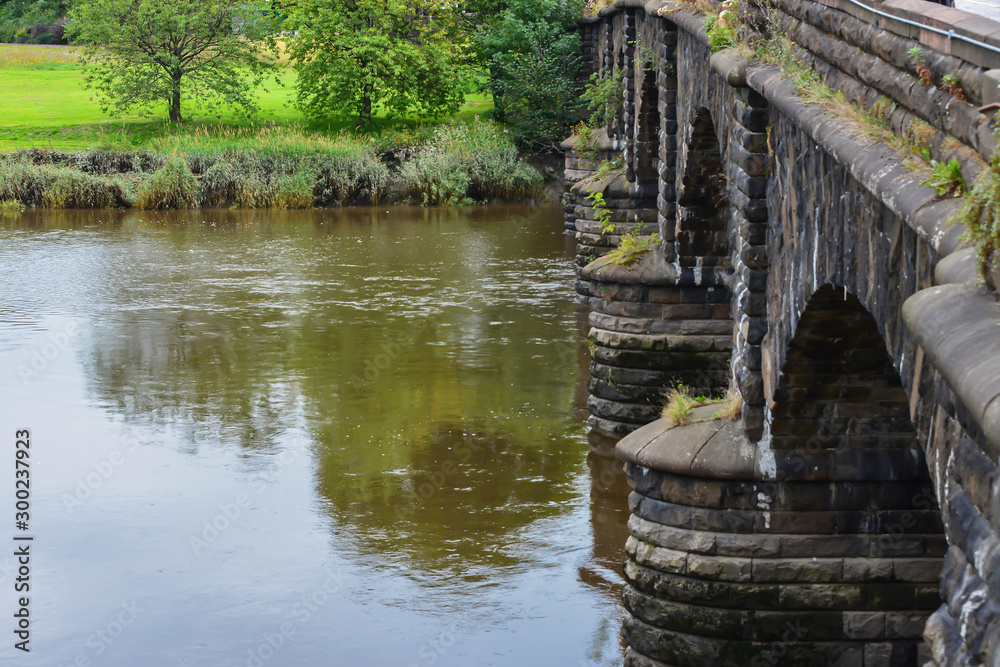 Arched stone bridge in the Highlands, Scotland Arched stone bridge in the Highlands, Scotland