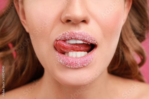 Beautiful young woman with sugar lips  closeup