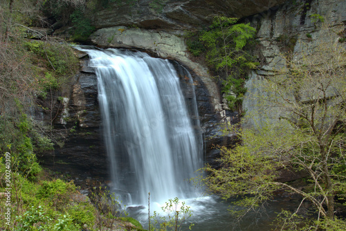 Silky smooth waterfalls flowing across rocks