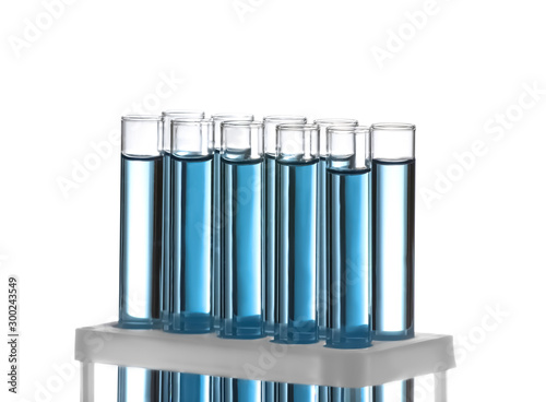 Test tubes with blue liquid isolated on white. Laboratory glassware