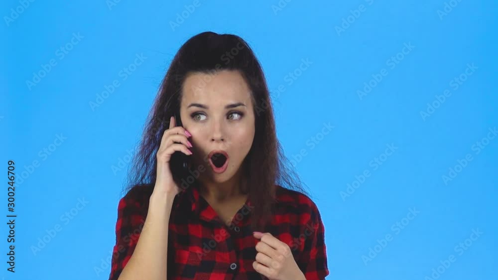 Pretty woman flirting by phone. Slow motion Pretty woman flirting by phone. Slow motion