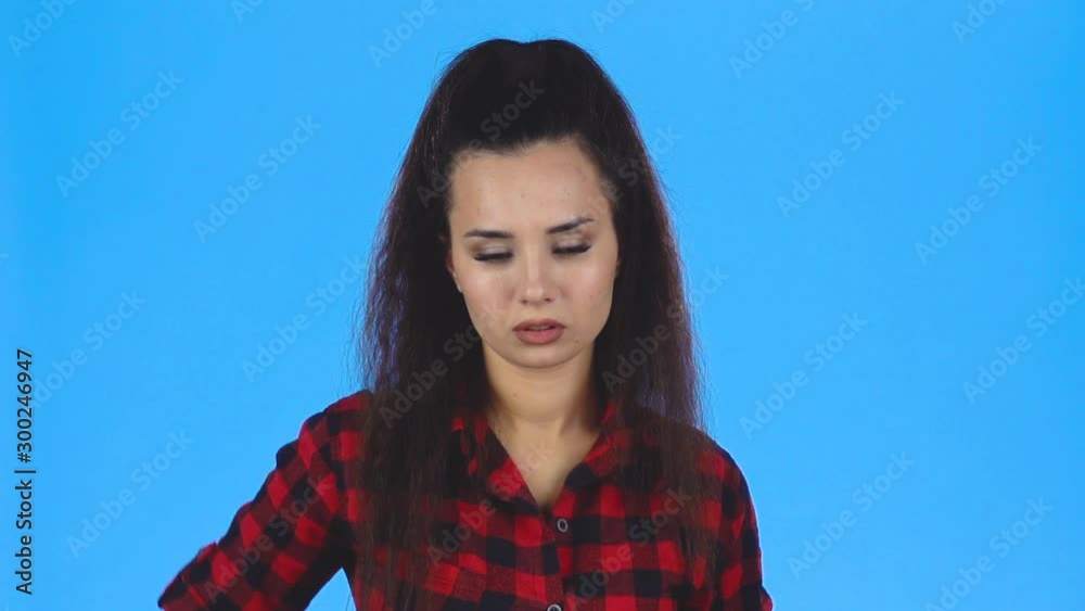 Lady looking at her phone and becoming surprised. Slow motion Lady looking at her phone and becoming surprised. Slow motion