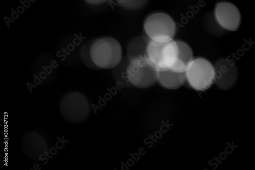 white bokeh abstract on Black background   © wanchai