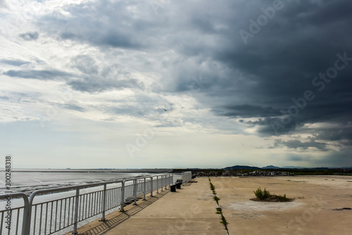 In summer  beautiful coastline and island scenery in cloudy background.