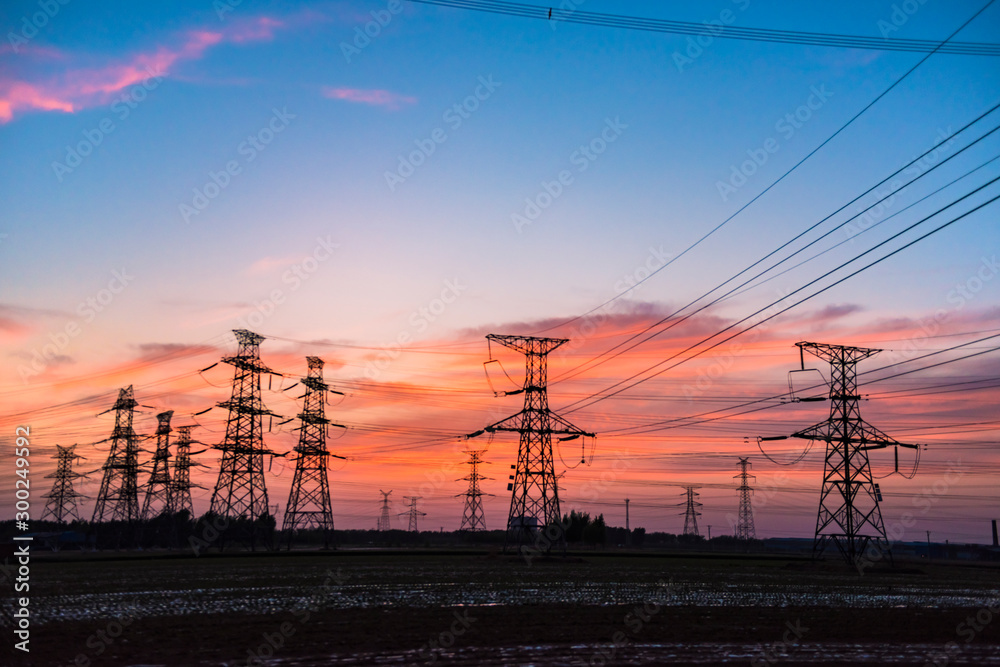 Contour of Transmission Tower at Sunset