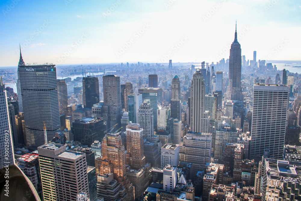 A skyline overlook viewpoint of Manhattan Including Empire State Building, Chrysler Building, Metlife Building and the One World Trade Center Tower in New York City 