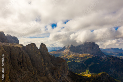 Aerial view of the Brunecker Turm, Langkofel Mountains and Passo Gardena Pass during sunset. Dolomites in South Tyrol photo
