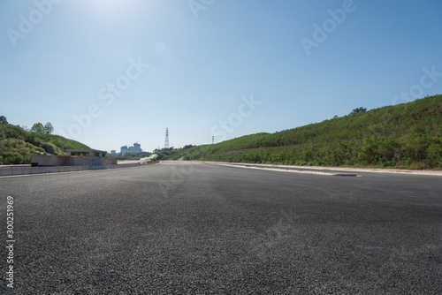 New tarmac road with sky low angle perspective landscape photo