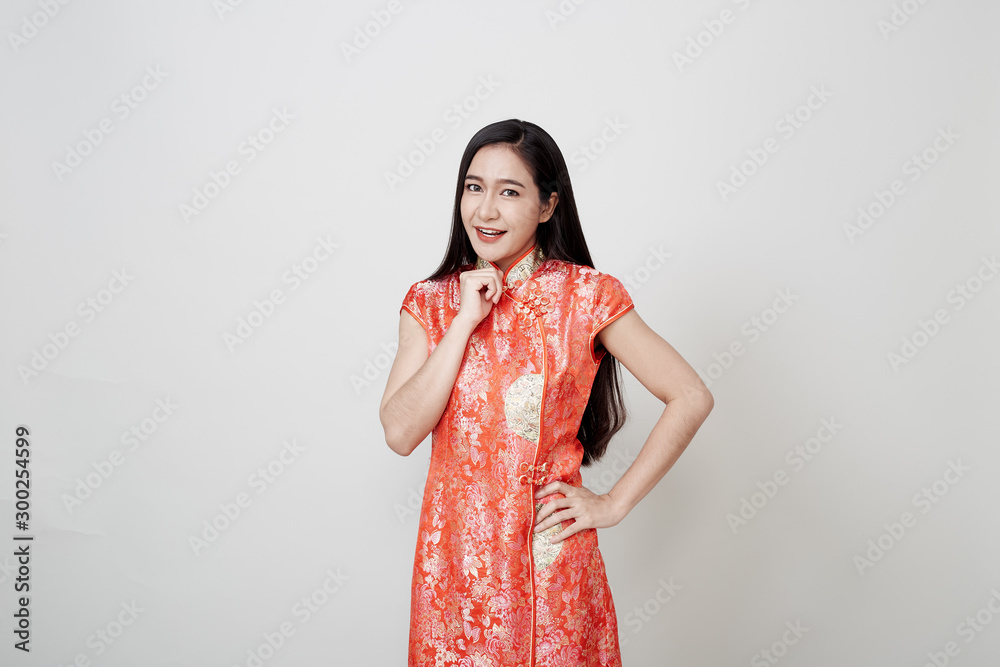 Asian woman wear cheongsam in chinese new year Asian woman wear cheongsam in chinese new year