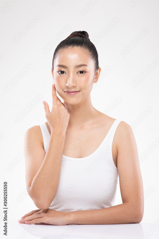 Beautiful Asian young woman touching soft cheek smile with clean and fresh skin Happiness and cheerful with positive emotional,isolated on white background,Beauty and Cosmetics Concept Beautiful Asian young woman touching soft cheek smile with clean and fresh skin Happiness and cheerful with positive emotional,isolated on white background,Beauty and Cosmetics Concept