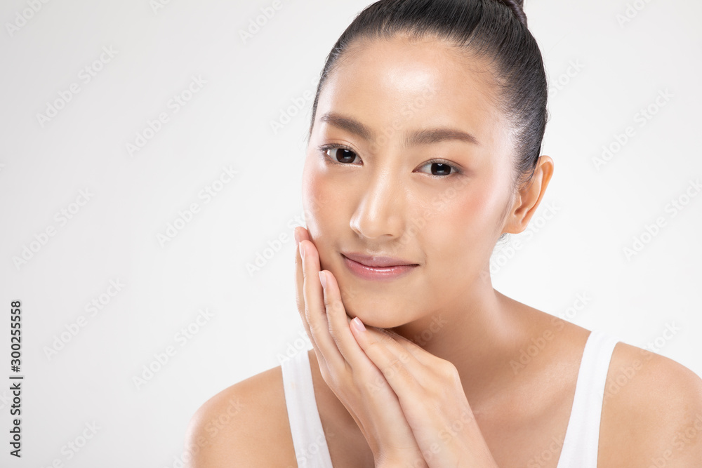 Beautiful Asian young woman touching soft cheek smile with clean and fresh skin Happiness and cheerful with positive emotional,isolated on white background,Beauty and Cosmetics Concept Beautiful Asian young woman touching soft cheek smile with clean and fresh skin Happiness and cheerful with positive emotional,isolated on white background,Beauty and Cosmetics Concept