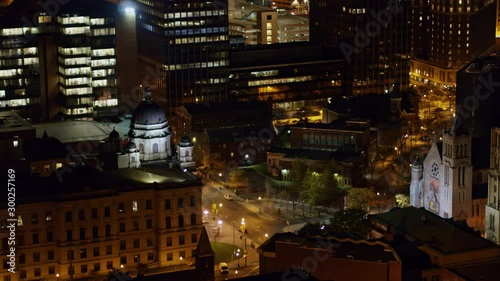 Syracuse New York Aerial v11 Short panning birdseye detail of side of court house at night - October 2017 photo