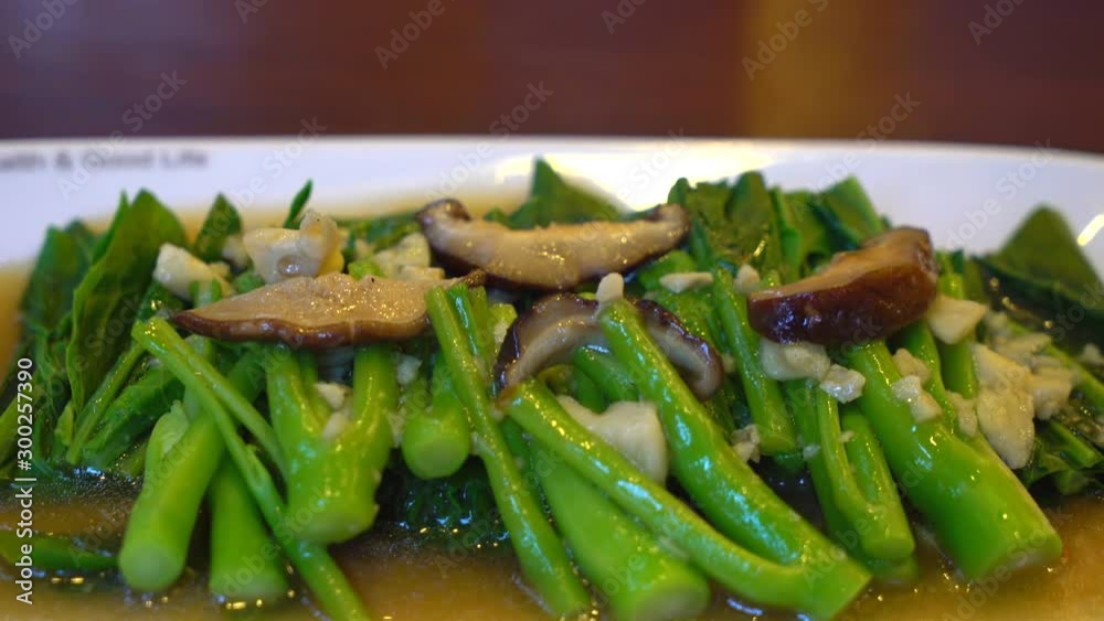 stir-fried chinese kale with shiitake mushroom stir-fried chinese kale with shiitake mushroom