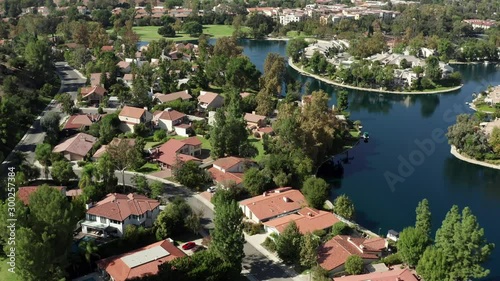 Flying Above Calabasas Lake and Upscale District With Expensive Villas and Mansion of Famous and Rich Residents, California USA, Aerial photo